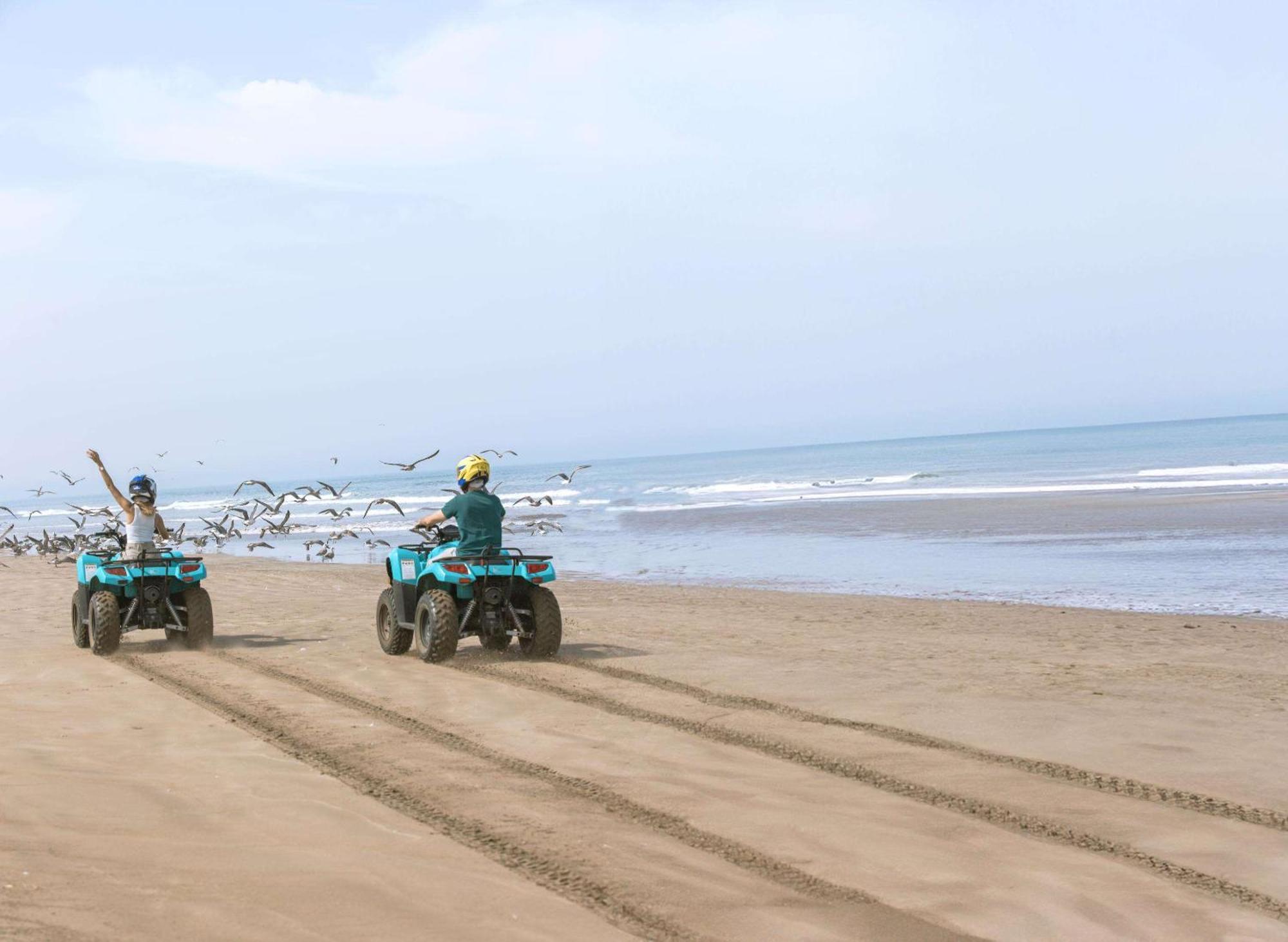 Mazagan Beach & Golf Resort Provincia di Provincia di El Jadida Esterno foto ATV riding on the beach